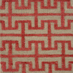 Flatweave rug with a geometric pattern in pink on a beige background