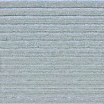 Detail of a handknotted rug in a raised stripe pattern in light grey