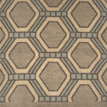 Detail of a hexagonal patterned rug in brown and gray tones
