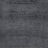 Handknotted rug in charcoal grey. 