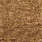 Handknotted cut pile rug in warm tan.