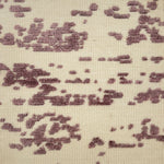 Textured fabric rug pattern with purple and beige colors