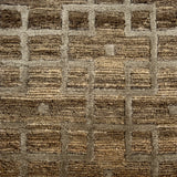 Close-up of a textured brown and beige carpet with a checkered pattern