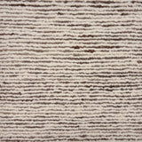 Detail of a handknotted in a subtle striated stripe pattern ivory and brown. 