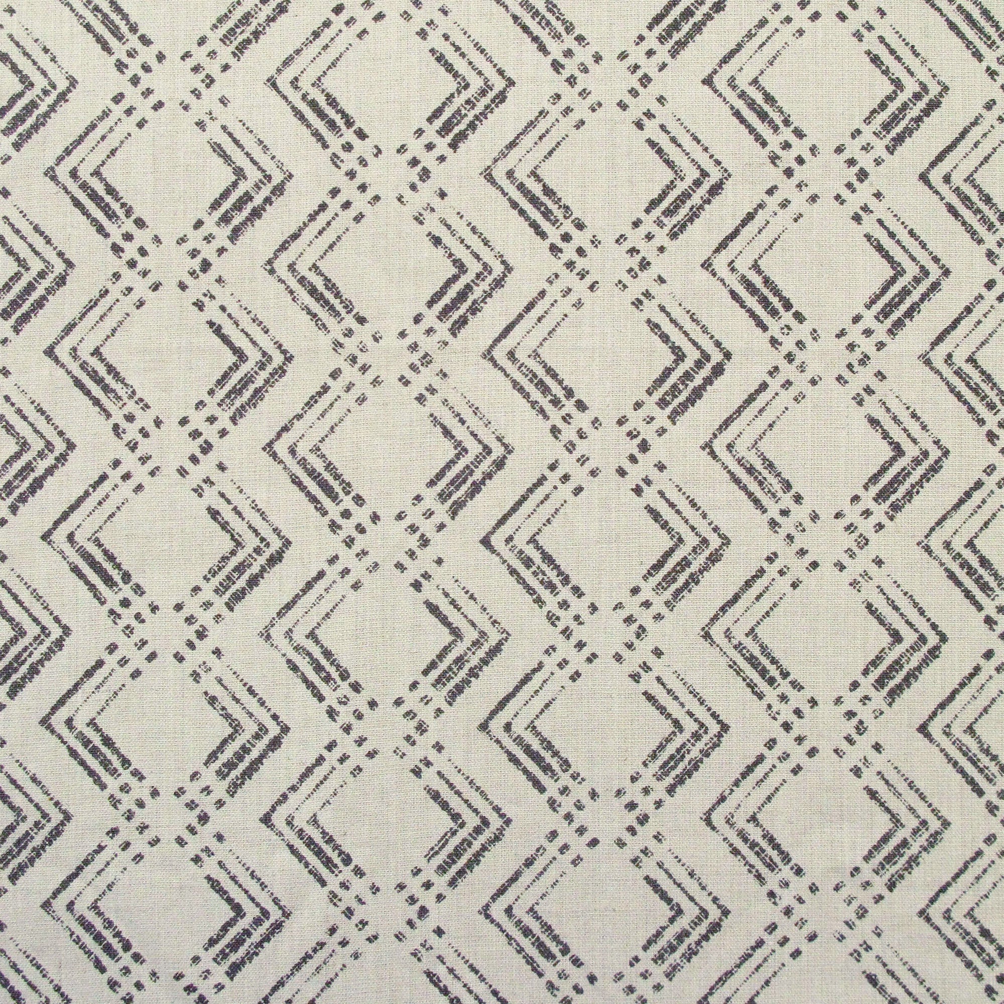 Fabric in a diamond grid pattern in charcoal on a tan field.