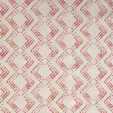 Fabric in a diamond grid pattern in coral on a tan field.