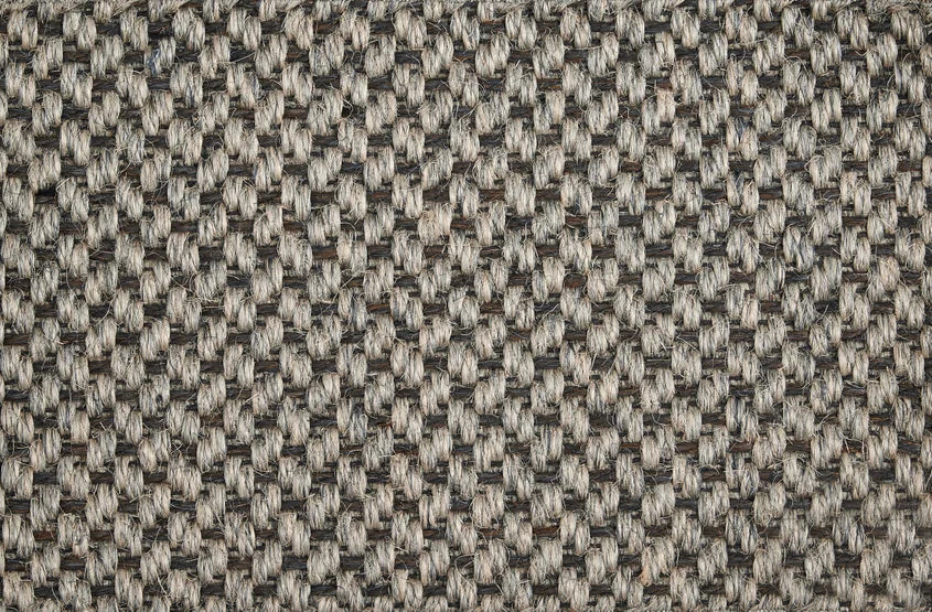 Broadloom carpet swatch in a herringbone pattern in a grey design