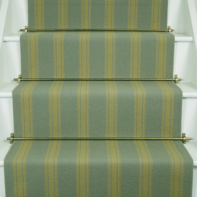 Striped flatweave runner in sage and lime green on white staircase