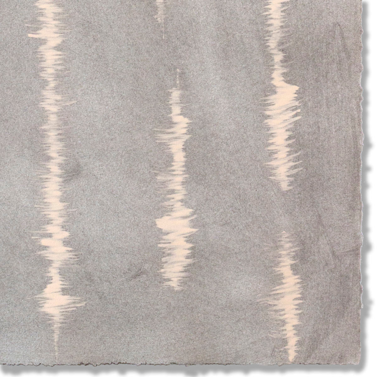 Detail of a hand-painted wallpaper swatch with an irregular vibrating linear pattern in peach on a greige field.