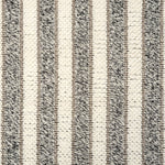 Broadloom carpet with stripes of cream and grey. 