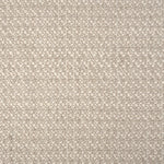 Textured broadloom carpet in ecru.