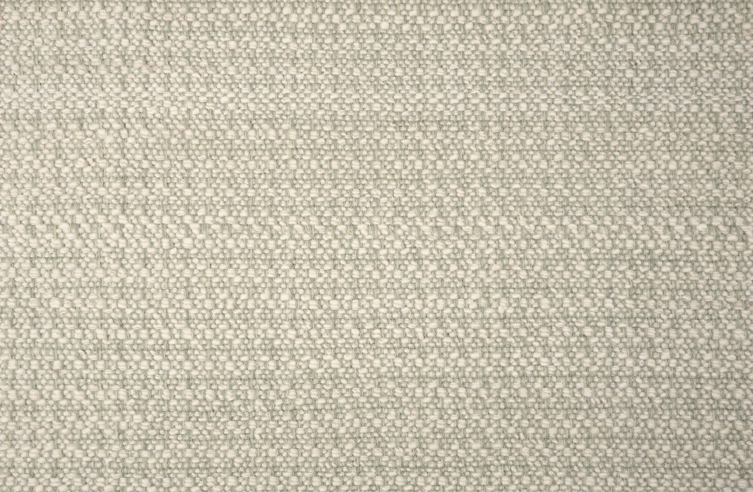 Textured broadloom carpet in soft grey. 
