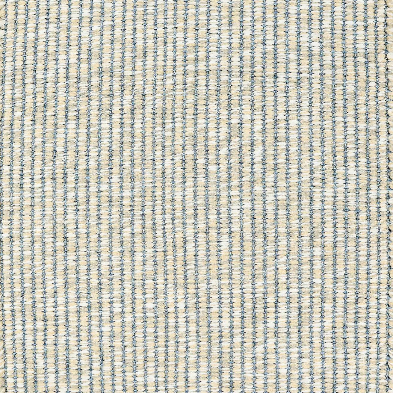 Textured woven outdoor carpet in slate blue and beige.