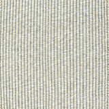 Textured woven outdoor carpet in slate blue and beige.