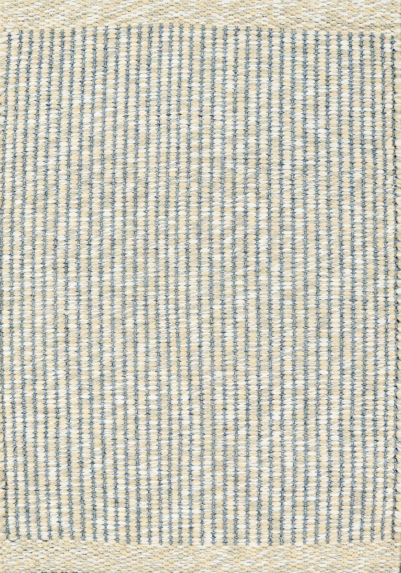 Textured woven outdoor carpet in slate blue and beige.