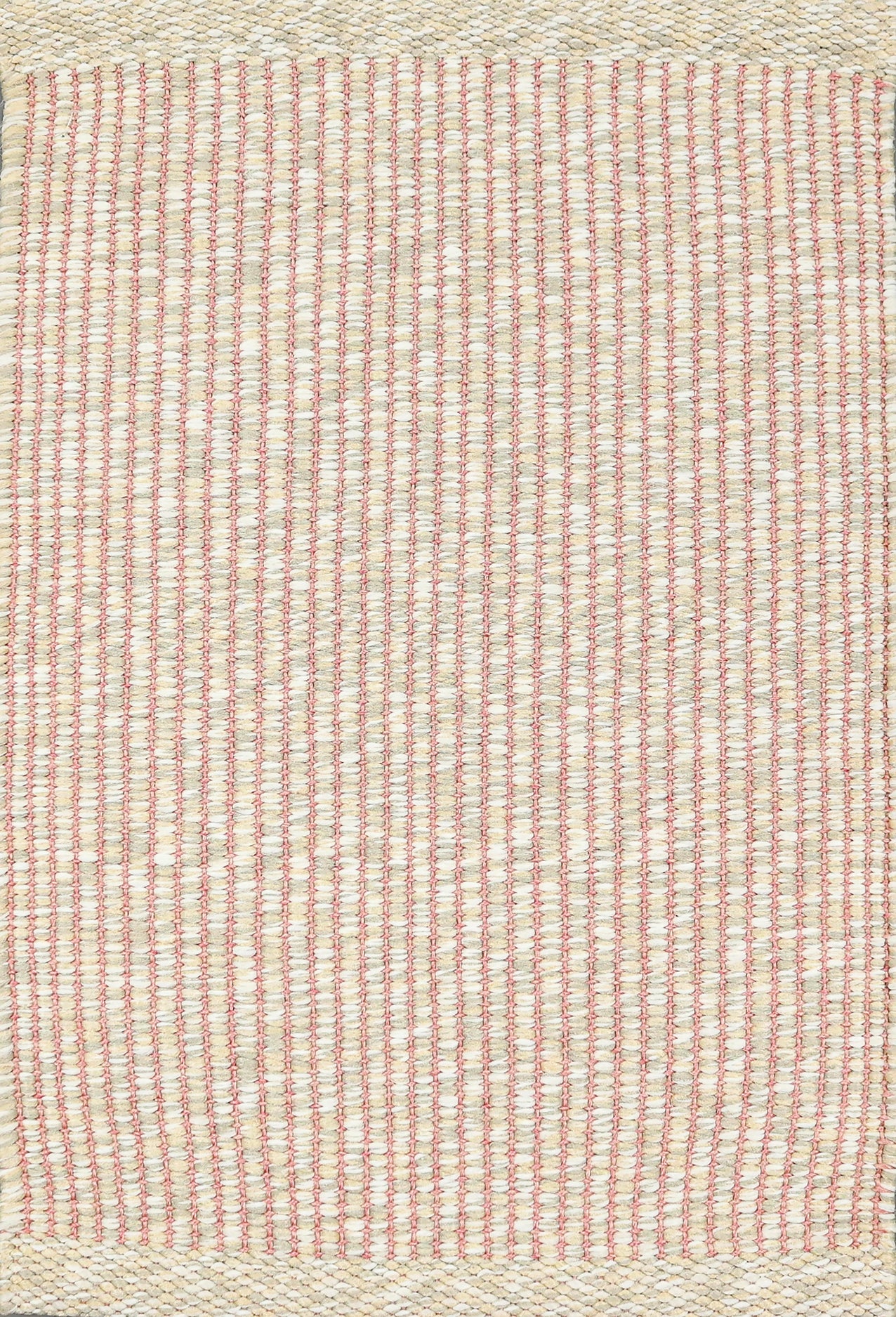 Textured woven outdoor carpet in pink and beige.
