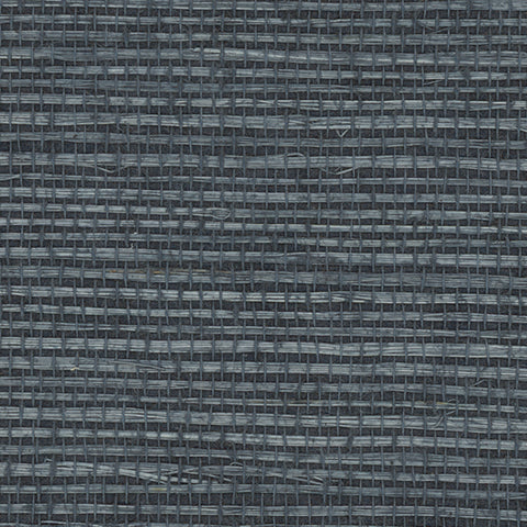 Detail of a sisal grasscloth wallpaper in blue on a navy paper backing.