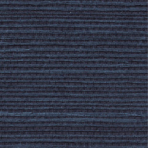 Detail of a sisal grasscloth wallpaper in mottled blue on a navy paper backing.