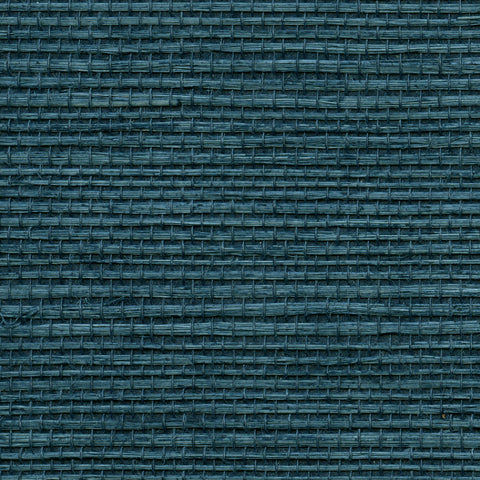 Detail of a sisal grasscloth wallpaper in dark turquoise on a paper backing.