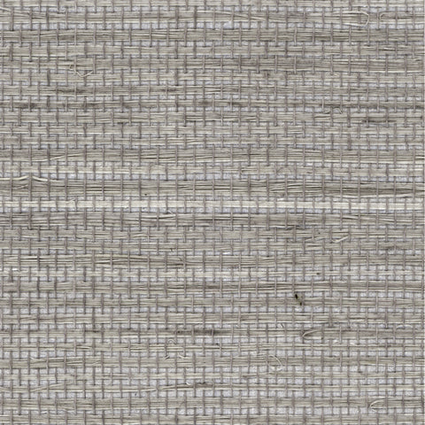 Detail of a sisal grasscloth wallpaper in mottled shades of gray on a paper backing.
