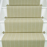 Striped flatweave runner in sage on white staircase