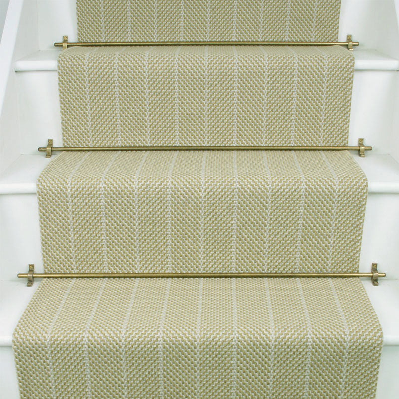 Striped flatweave runner in sage on white staircase