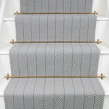 Striped flatweave runner in slate grey on white staircase