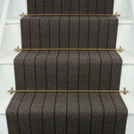 Striped flatweave runner in brown on white staircase