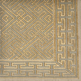 Handknotted rug with a greek key pattern in grey, ochre and ivory. 