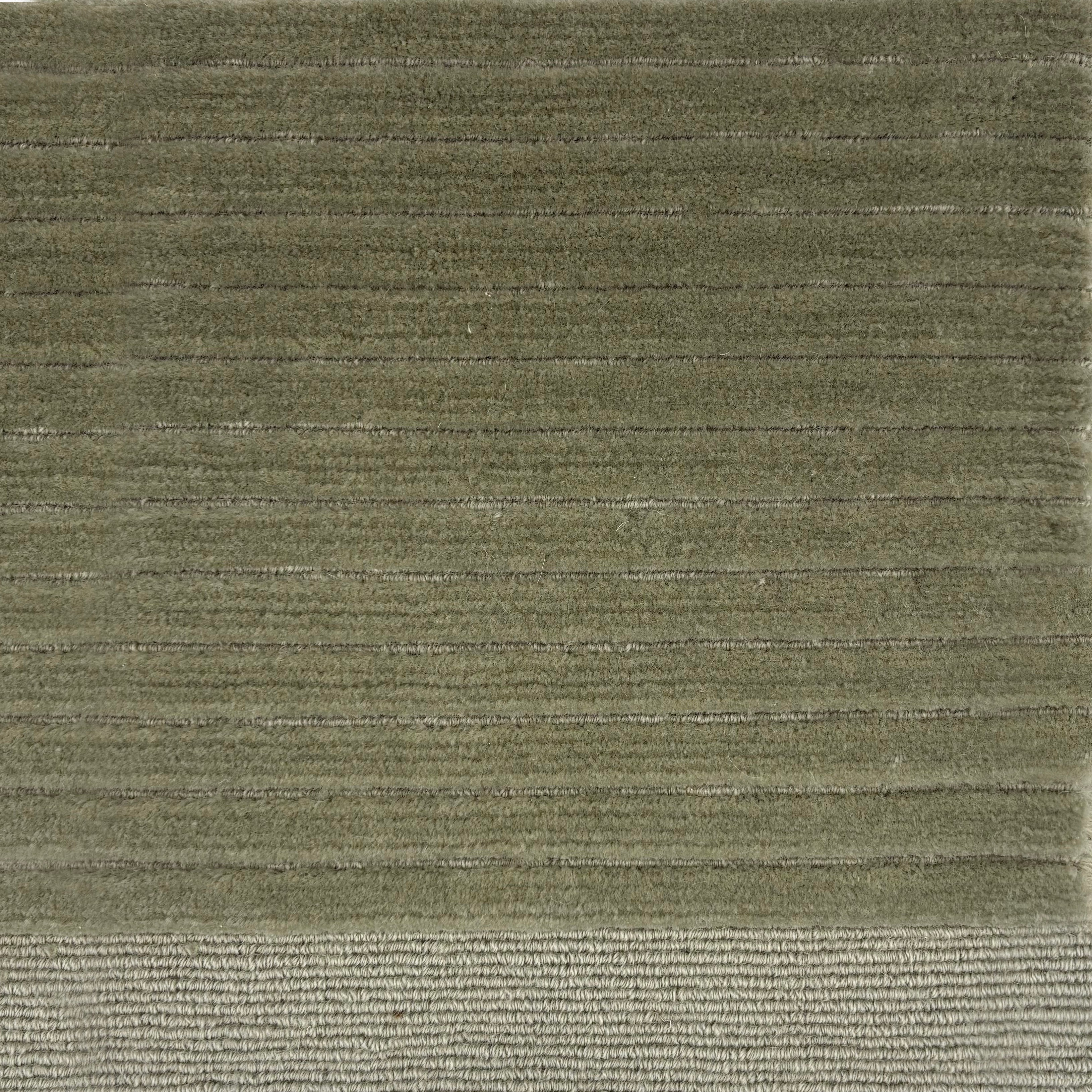 Handknotted rug in a cut pile & loop stripe in solid sage green. 