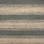 Flatwoven rug in a wide stripe in slate blue with strié cream and navy stripes.