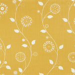 Detail of fabric in a playful floral stripe in white on a mustard field.