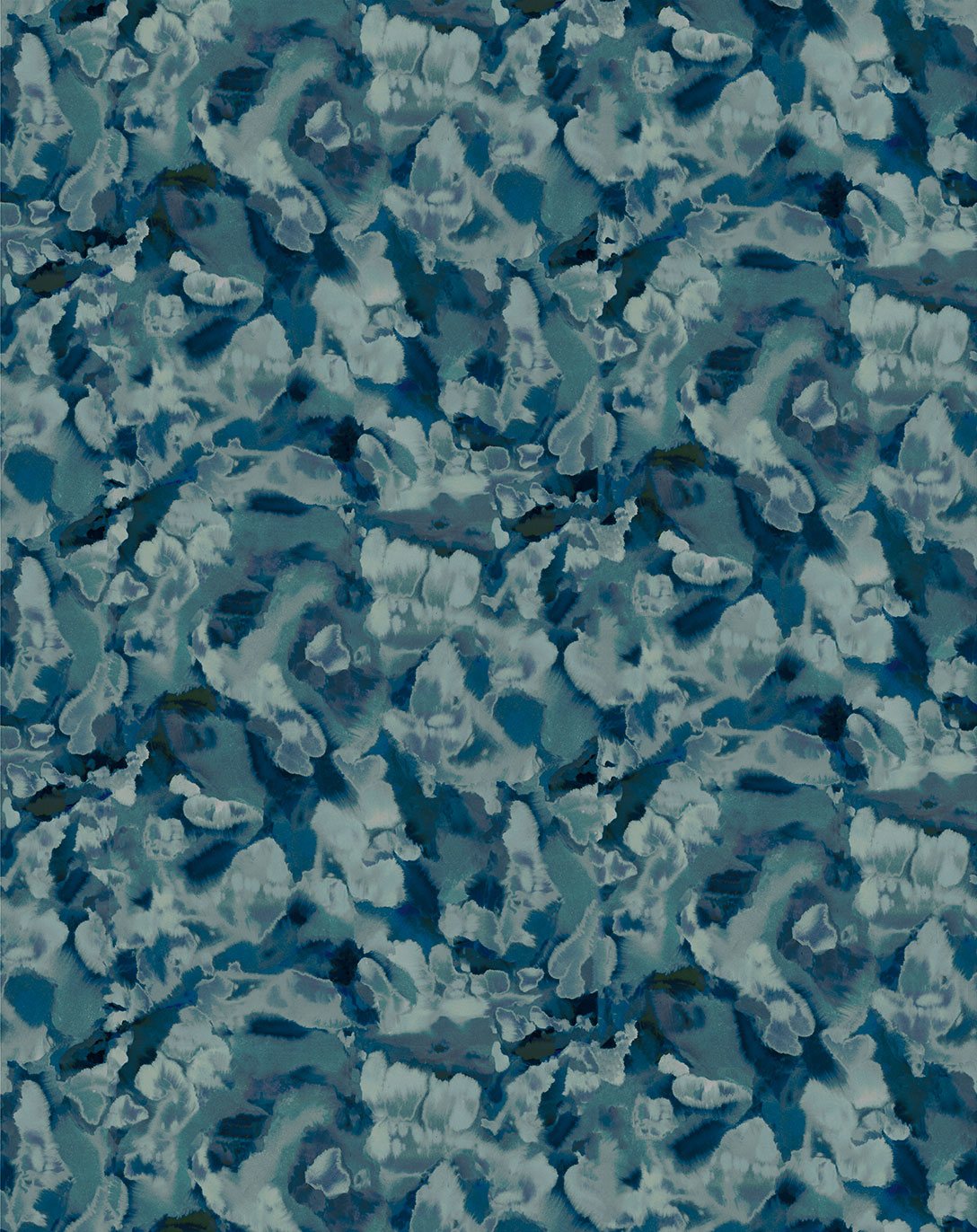 Detail of fabric in an abstract paint print in shades of blue, navy and turquoise.