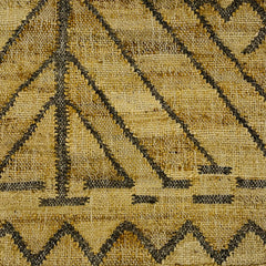 Woven rug swatch in natural fibers in a large scale linear design, the lines are charcoal brown on a tan field.