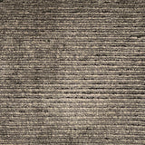 Handknotted cutpile rug in warm grey.