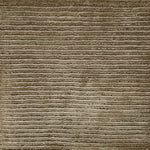 Handknotted cutpile rug in taupe.