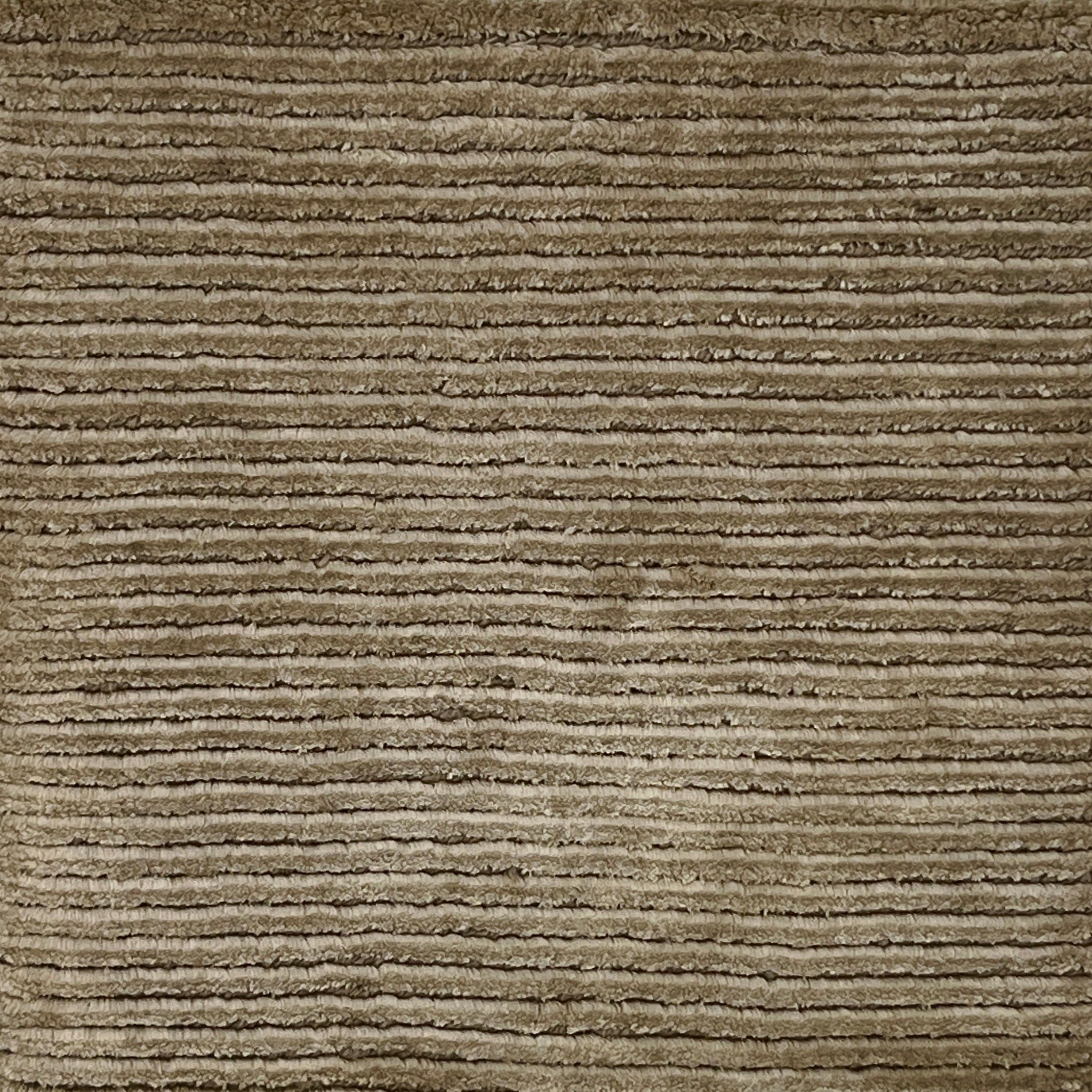Handknotted cutpile rug in taupe.