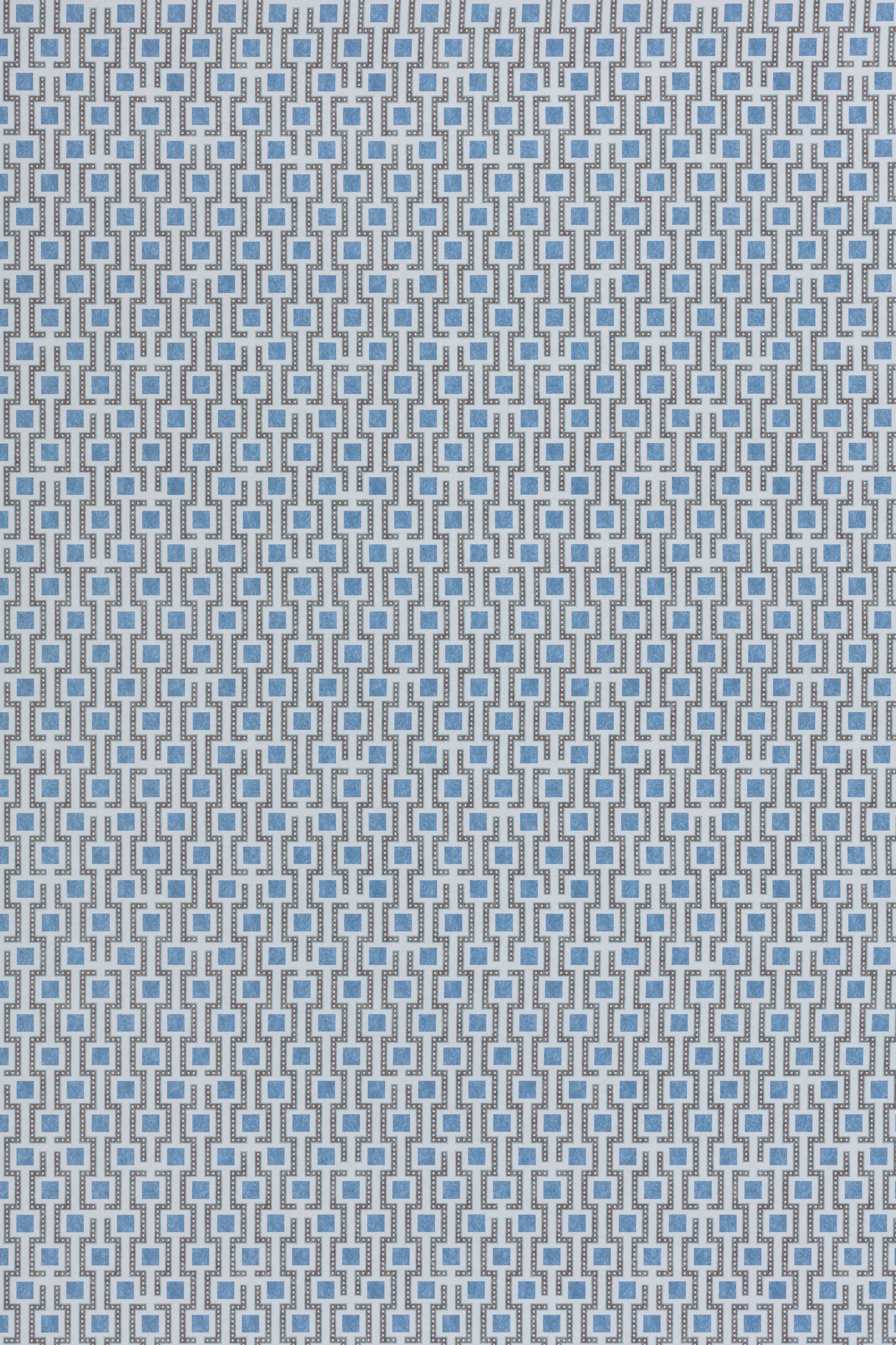 Wallpaper panel in a geometric grid print in shades of blue and gray.