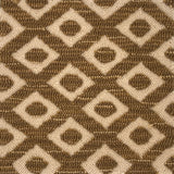Close-up of a brown and beige geometric patterned rug.
