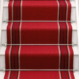 Striped flatweave runner in red on white staircase