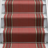 Striped flatweave runner in red on white staircase