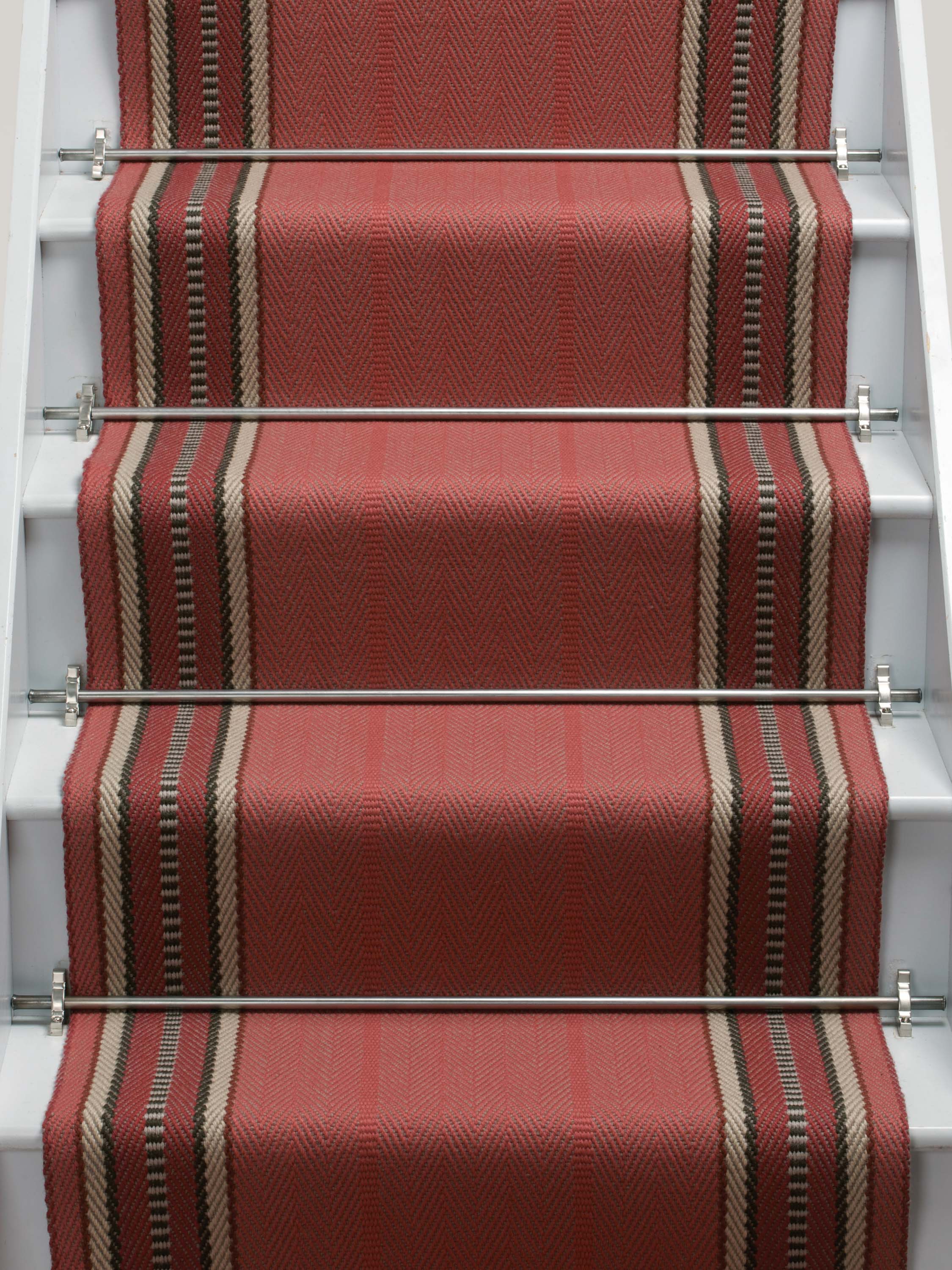 Striped flatweave runner in red on white staircase