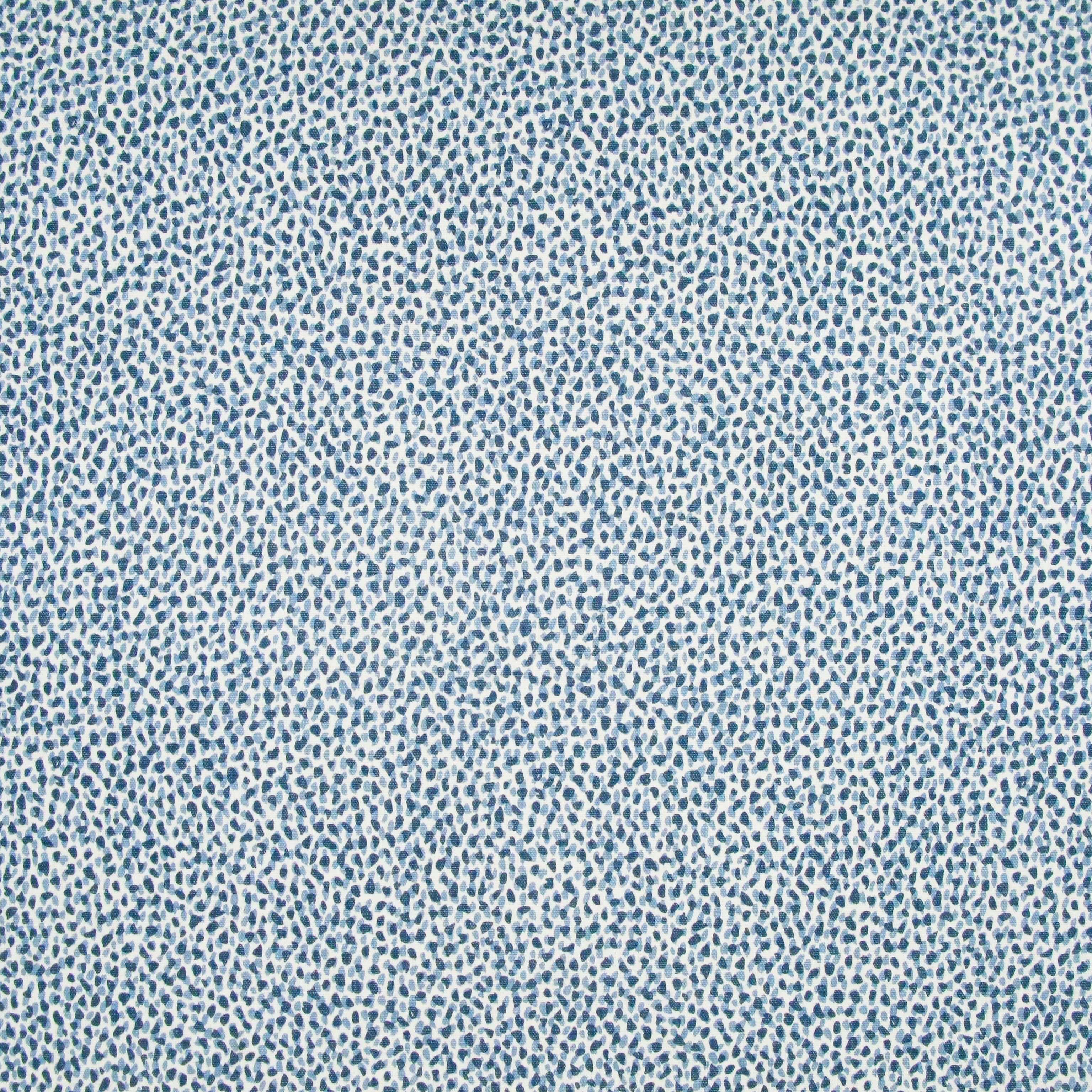 Fabric in a dappled animal print in shades of blue and navy on a cream field.