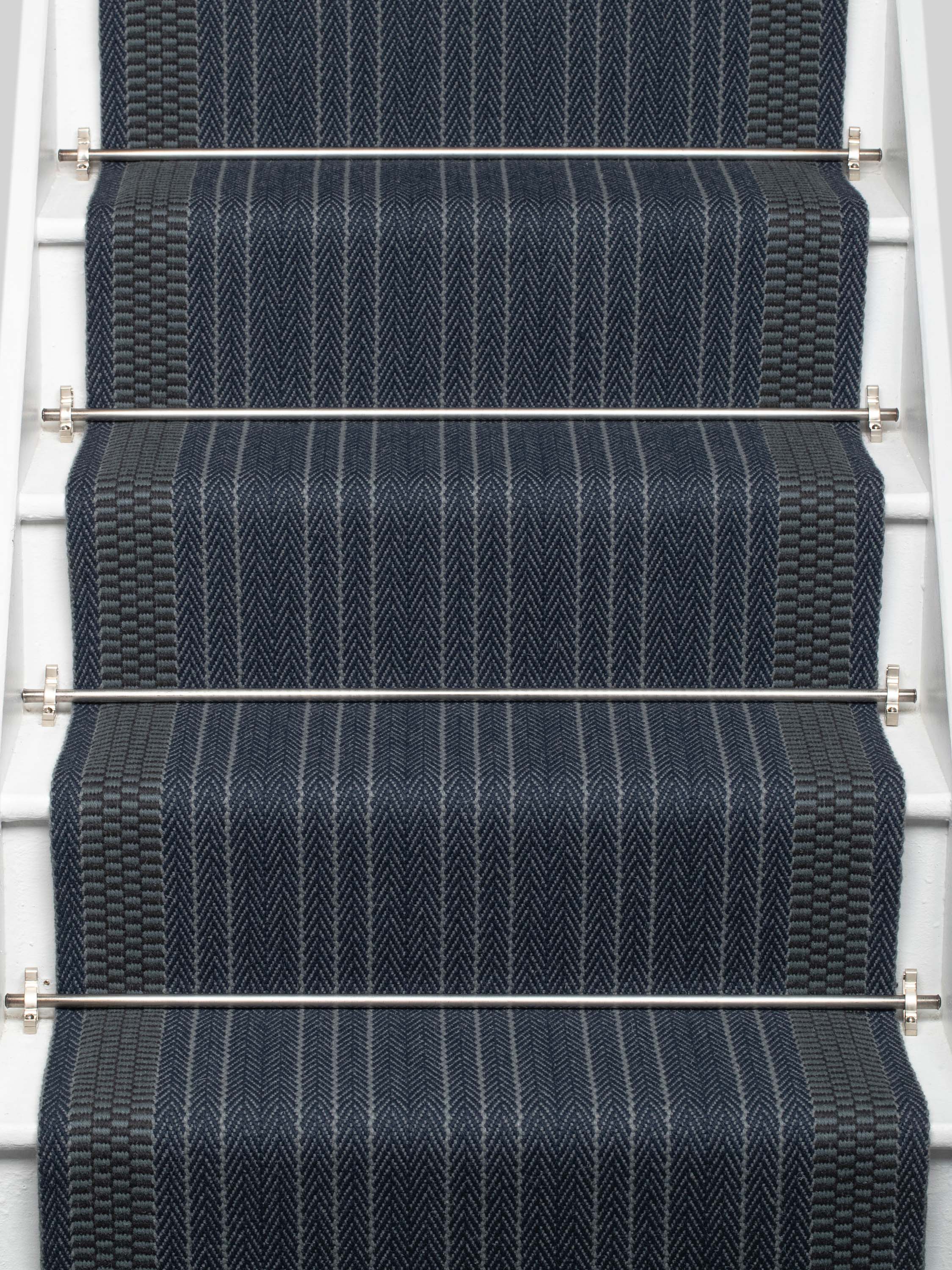 Striped flatweave runner in blue on white staircase