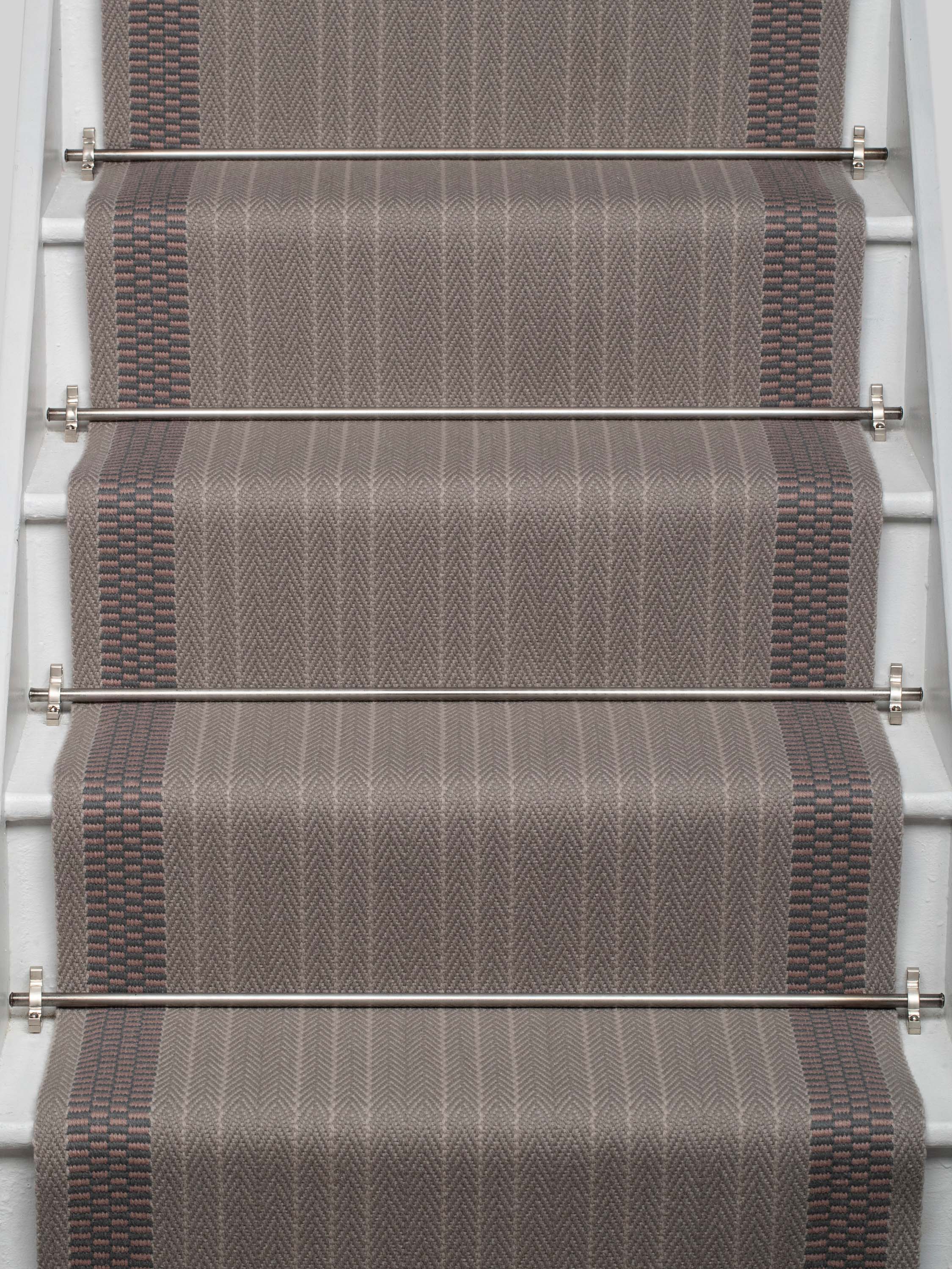 Striped flatweave runner in grey and taupe on white staircase