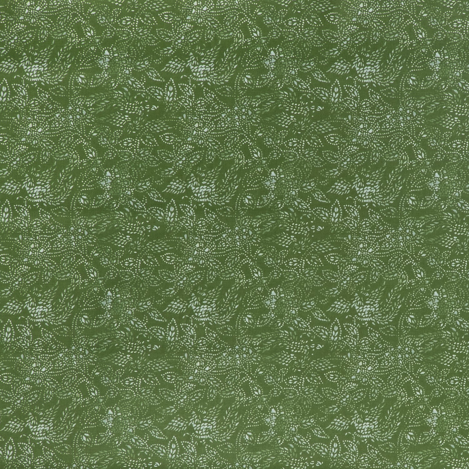 printed linen fabric in a dotted leaf pattern in white on a green field.