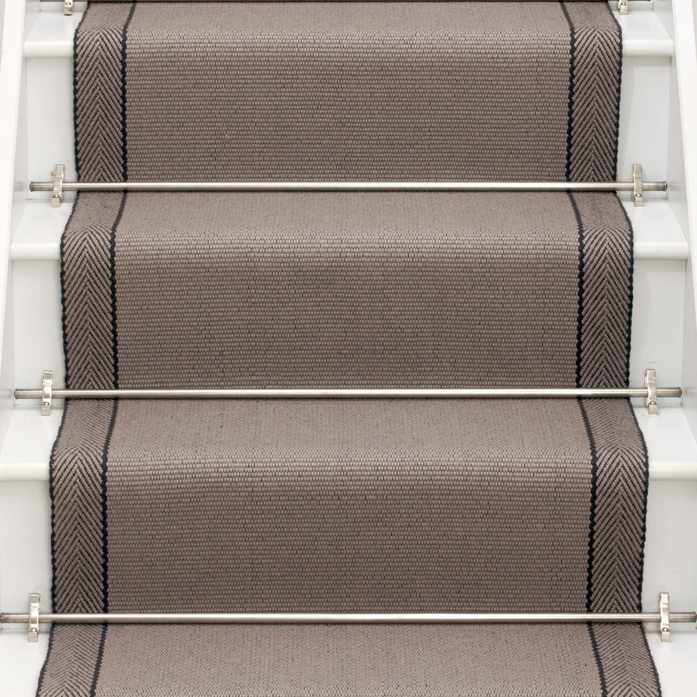 Striped flatweave runner in taupe on white staircase