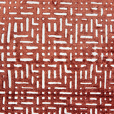 Handknotted rug sample with a geometric lattice pattern in rust red on a white field.