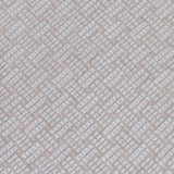 Close up of embroidered fabric with a basketweave design in cream on a beige field. 