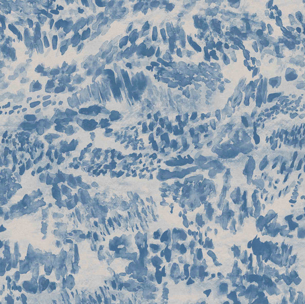 Detail of fabric in a painterly cloud print in shades of blue and navy on a cream field.